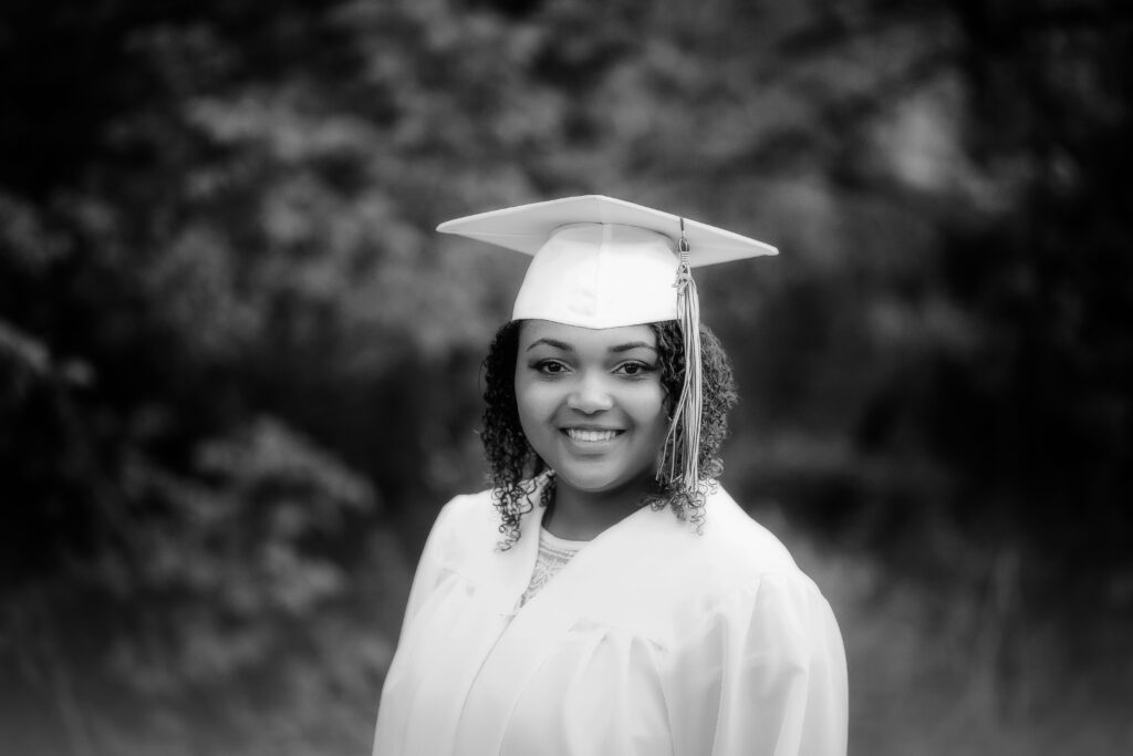 black and white image of cap & gown female.