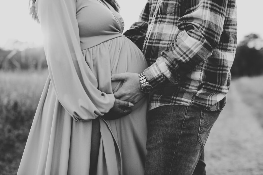 Expectant parents photographed by Four Souls Photography